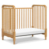 M7398HY,DaVinci,Jenny Lind 3-in-1 Convertible Mini Crib in Honey