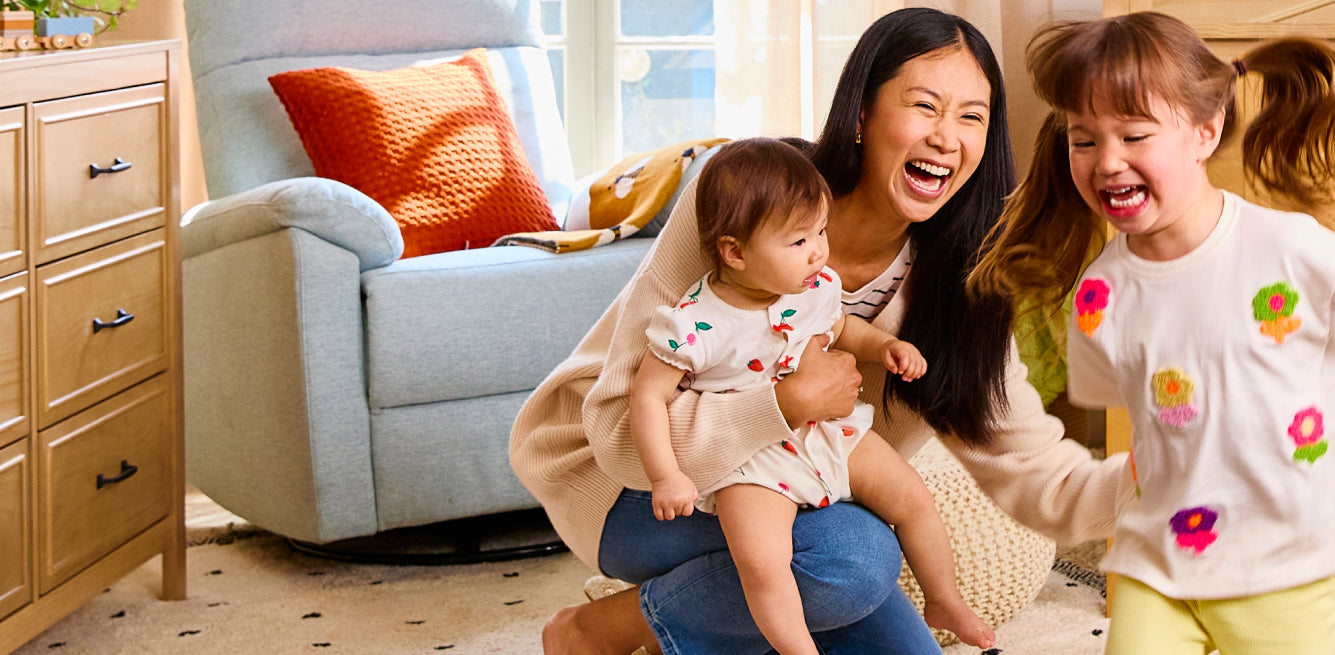 Image of Suzy Recliner and Swivel Glider, a mom, toddler and a kid