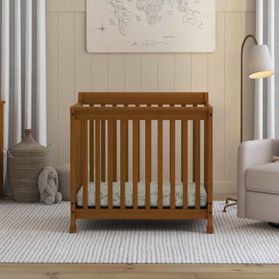 M5598CT,DaVinci,Kalani 4-in-1 Convertible Mini Crib in Chestnut Finish