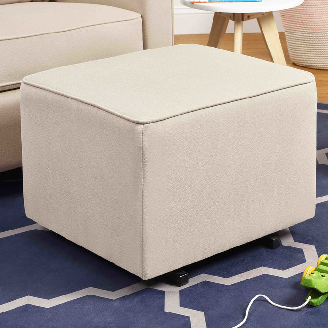 M13985CM,DaVinci,Davinci Universal Gliding Ottoman in Cream Finish with Cream Piping