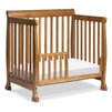 M5598CT,DaVinci,Kalani 4-in-1 Convertible Mini Crib in Chestnut Finish