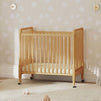 M7398HY,DaVinci,Jenny Lind 3-in-1 Convertible Mini Crib in Honey