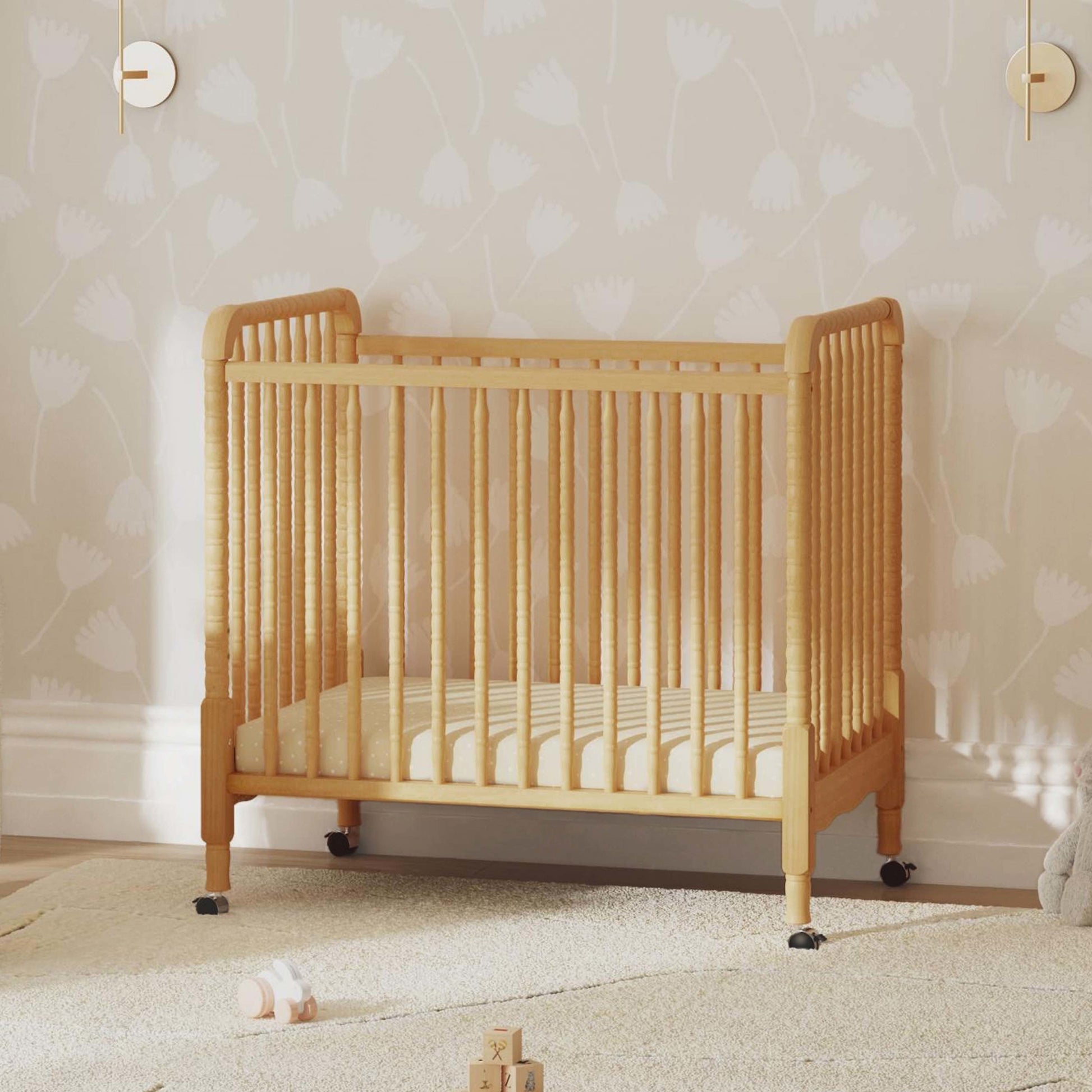 M7398HY,DaVinci,Jenny Lind 3-in-1 Convertible Mini Crib in Honey