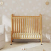 M7398HY,DaVinci,Jenny Lind 3-in-1 Convertible Mini Crib in Honey