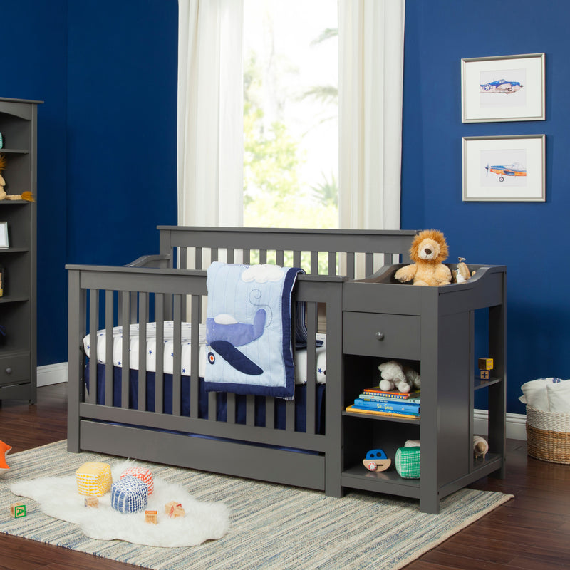 Mini crib with changing best sale table attached